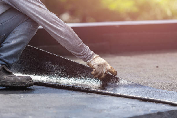 Professional Waterproofing technician working in Gregory, MI